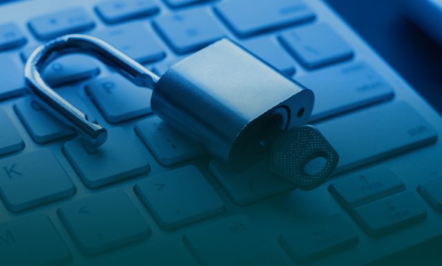 on image unlocked padlock on the keyboard