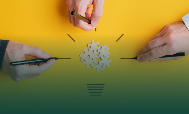 on the image lightbulb made of puzzle pieces with marker-drawn elements